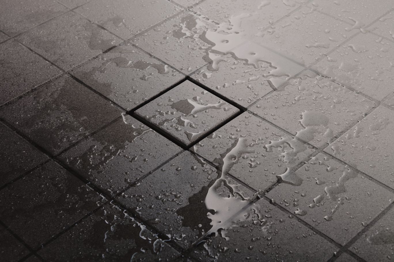 KD_TileableGrate_Altered Image of invisible drain added as part of a custom shower installation by Wilkerson Floors.