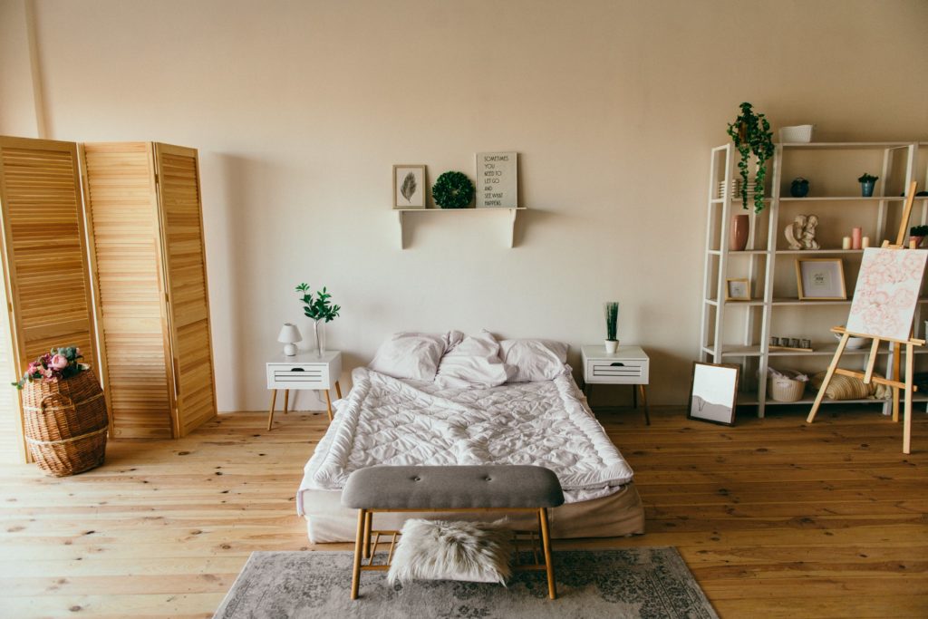 Minimalist room with bare hardwood floor adds value ascetically and will last a lifetime.