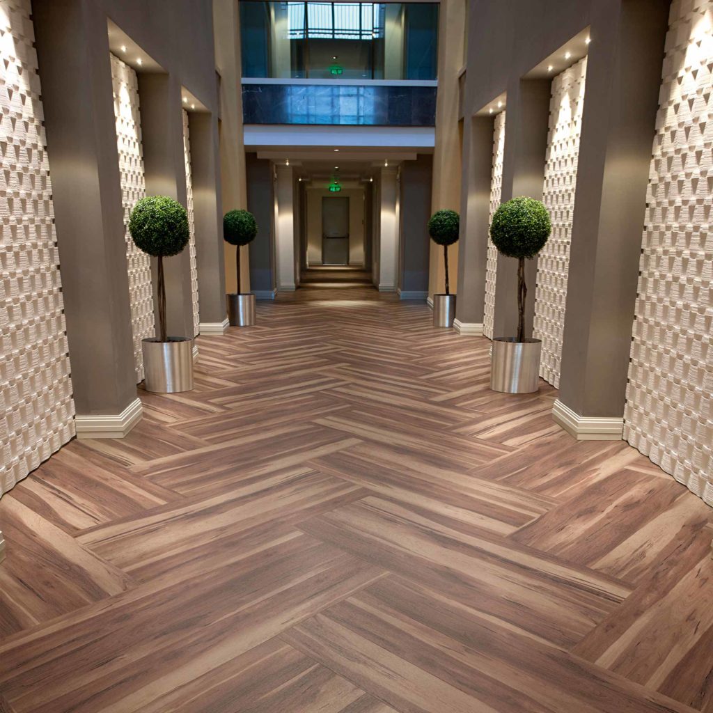 Hospitality floorin example of installled luxury vinyl tiles LVT.